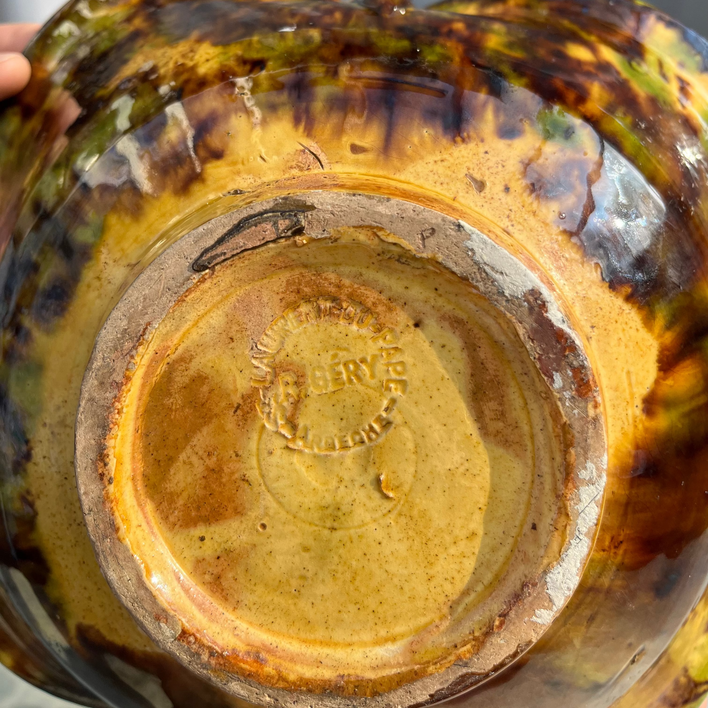 Vintage tortoiseshell ceramic bowl with twisted handle detailing