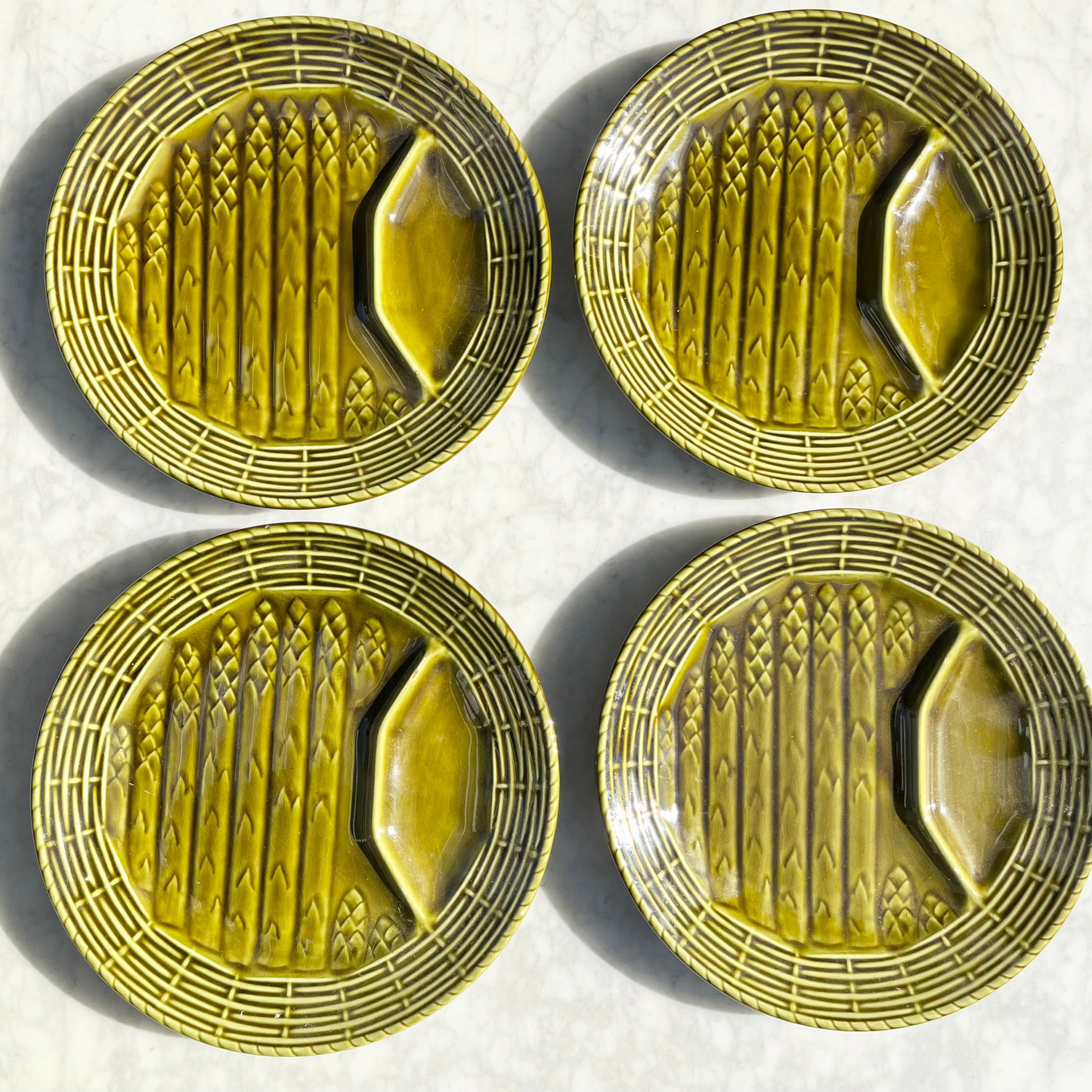 Olive green French majolica asparagus plates