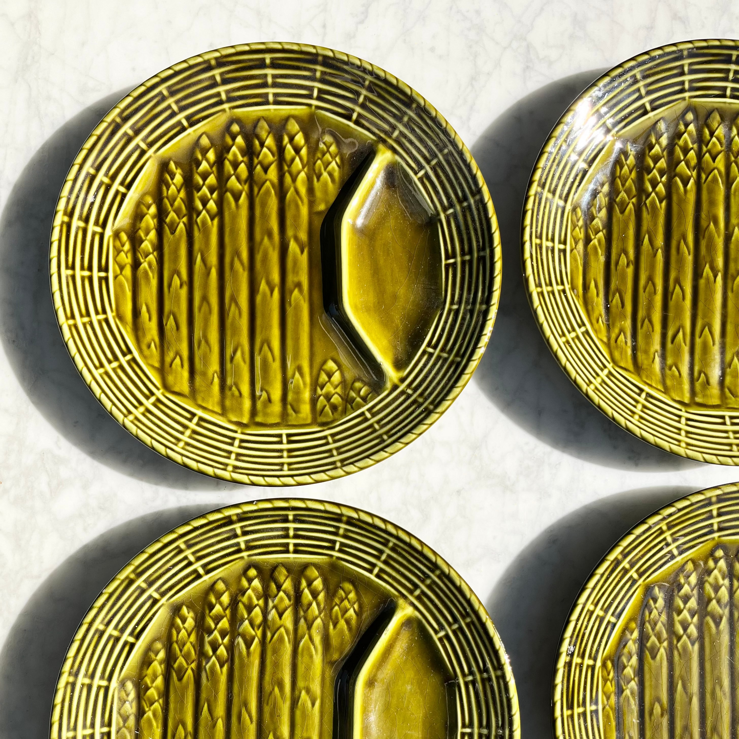 Olive green French majolica asparagus plates