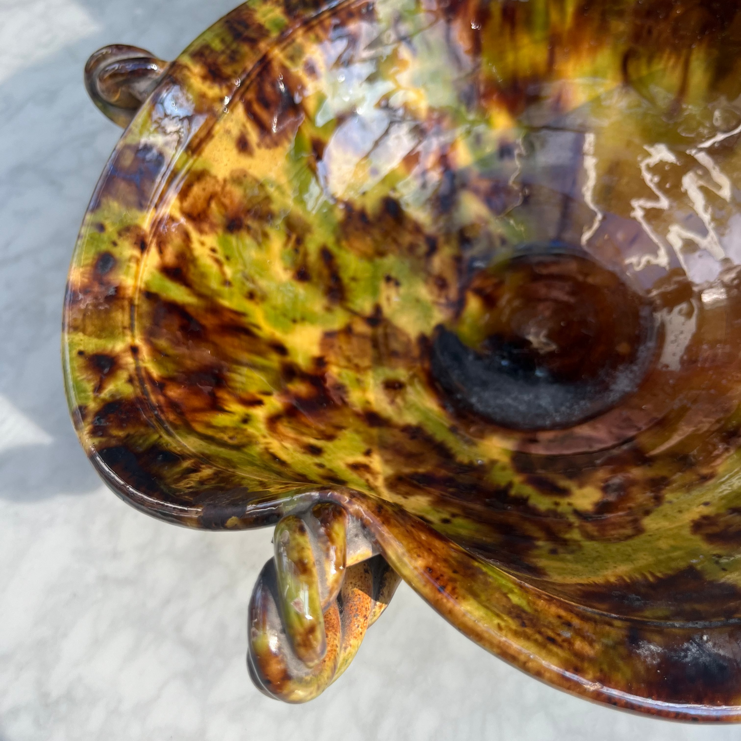 Vintage tortoiseshell ceramic bowl with twisted handle detailing