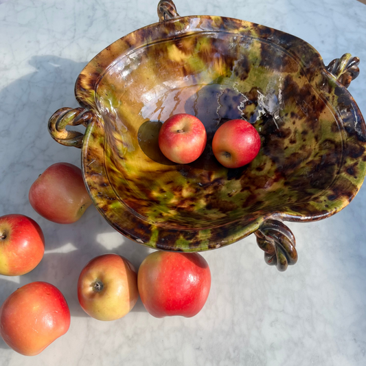 Vintage tortoiseshell ceramic bowl with twisted handle detailing